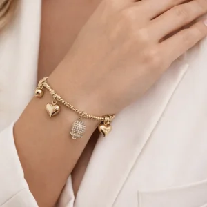 Bracciale Ginevra oro con pendenti cuore e campanella