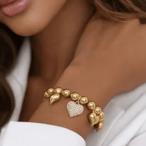 Bracciale Anima oro con pendenti a forma di cuore