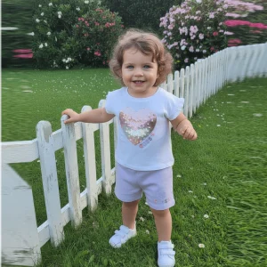 Completo GUESS neonata t-shirt cuore paillettes e shorts rosa 0 mesi - 24 mesi